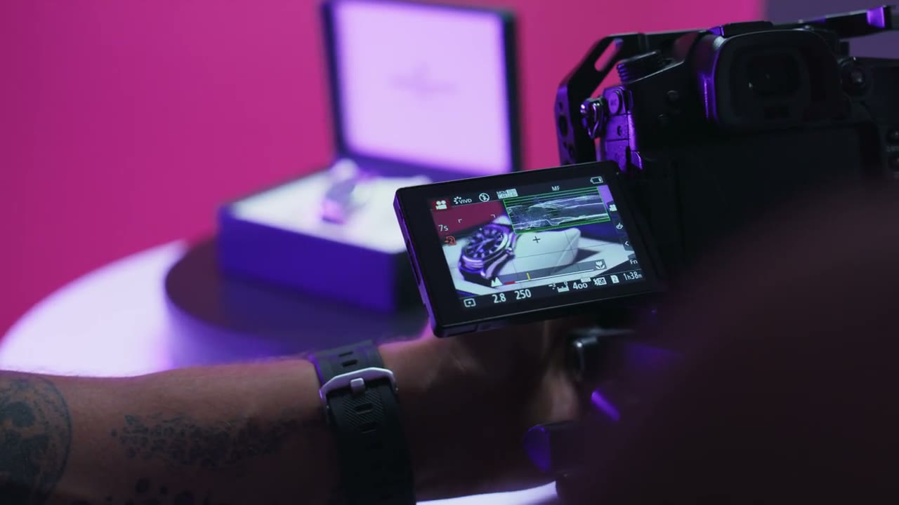 Behind-the-scenes stock frame of a product filmmaking setup.